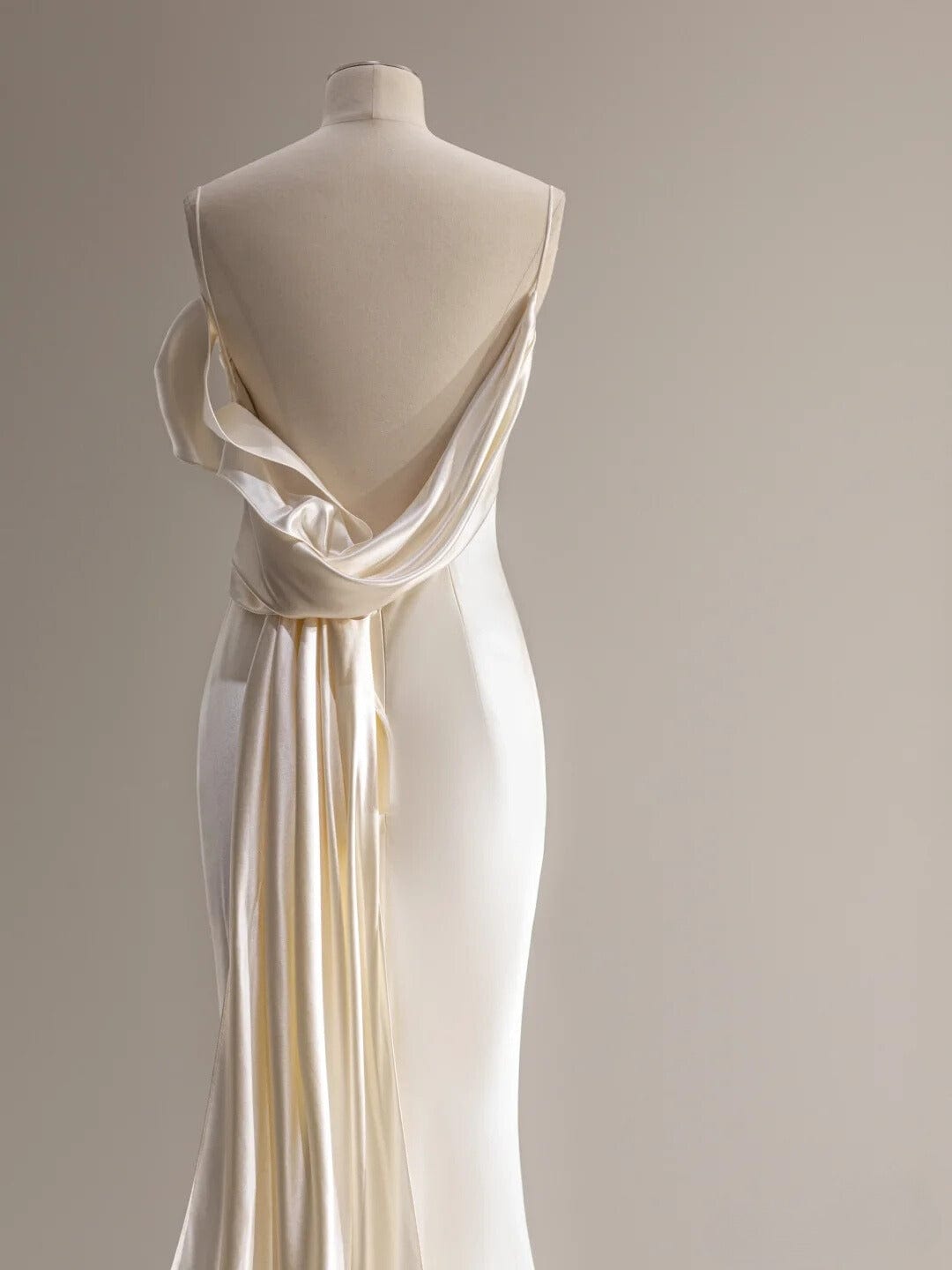 Custom silk wedding dress with stunning draped cowl back